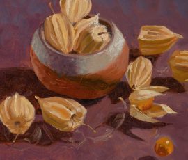 Cape Gooseberries, hand pinch pot, suspended on glass on purple background.